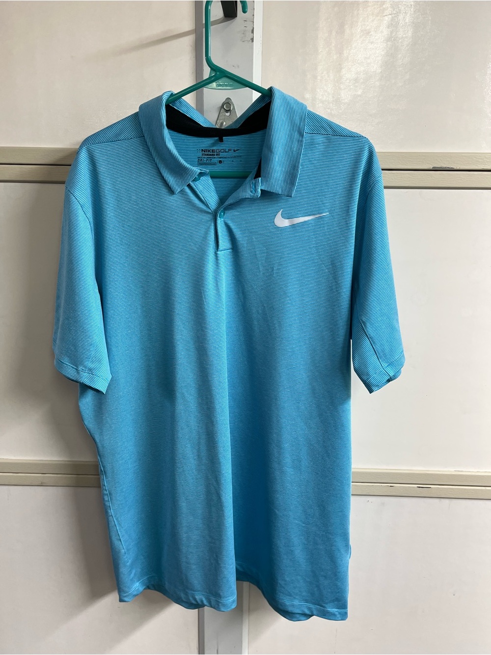 Nike Blue Men’s Golf Polo with White Swoosh